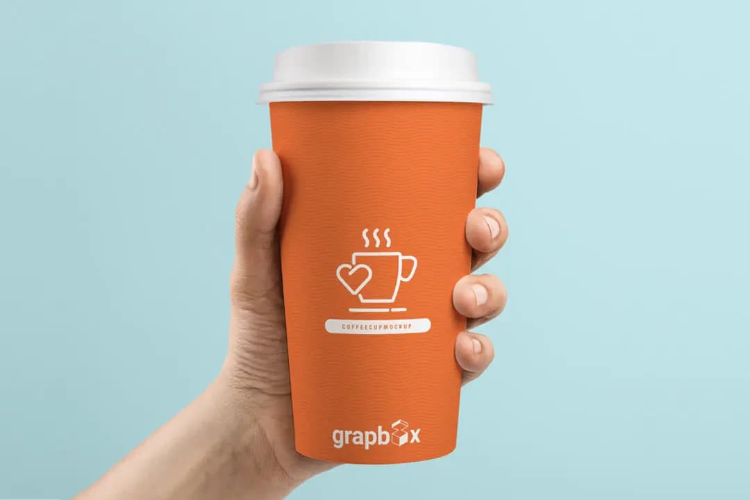 Coffee Cup In Hand Mockup Free PSD – Mockups creative asset